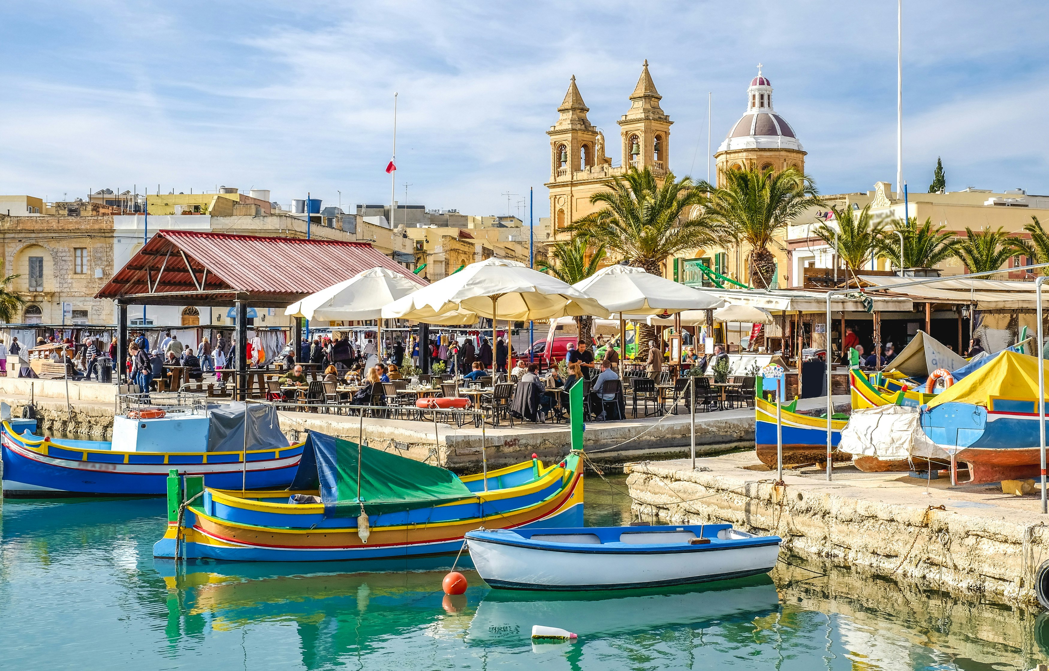 Marsaxlokk Market, with its traditional luzzu boats